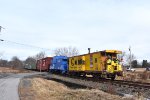 The two cabooses on the rear of the train as it crosses Rockafellow Ln Grade Crossing